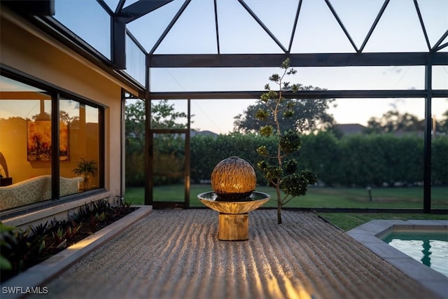 sunroom with a pool