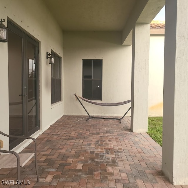 view of patio terrace at dusk