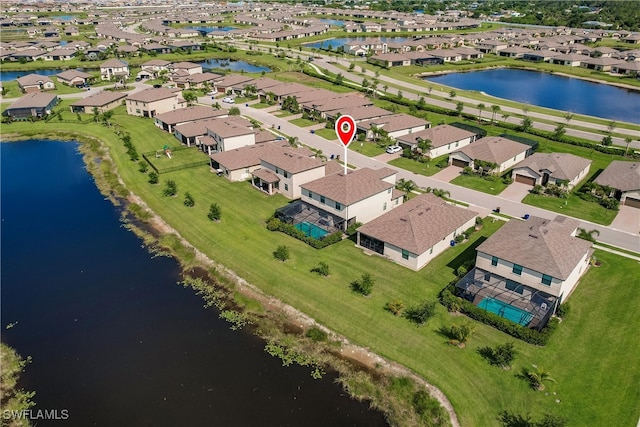 drone / aerial view featuring a water view