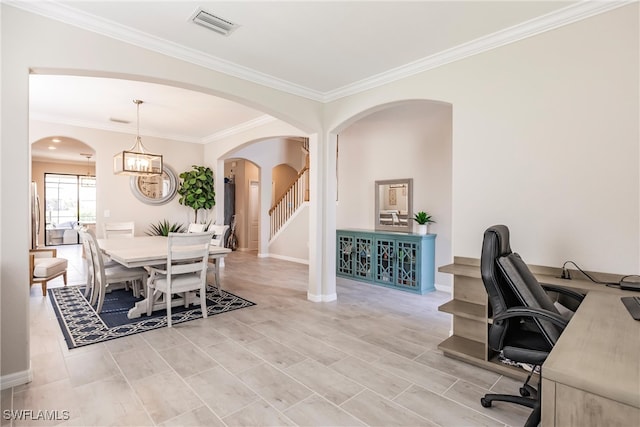 interior space with a notable chandelier and ornamental molding