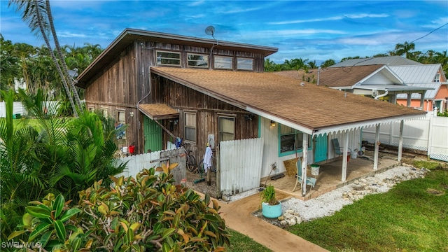 rear view of house with a patio area