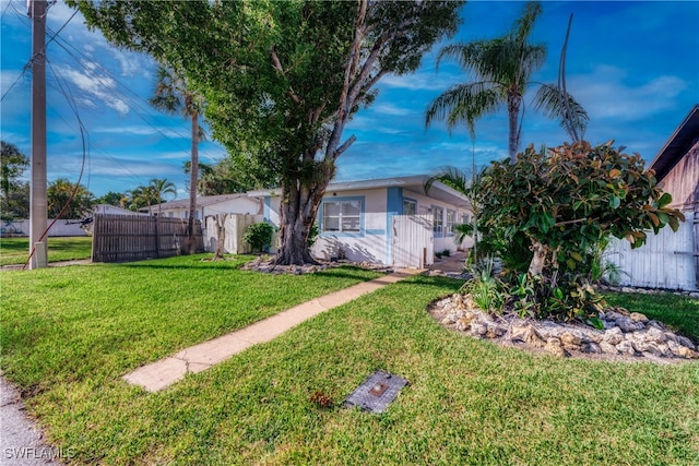 view of front of home with a front yard