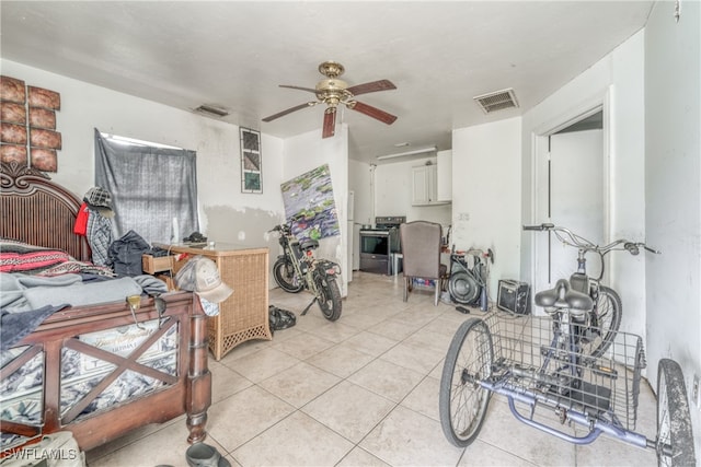 miscellaneous room with light tile patterned floors and ceiling fan