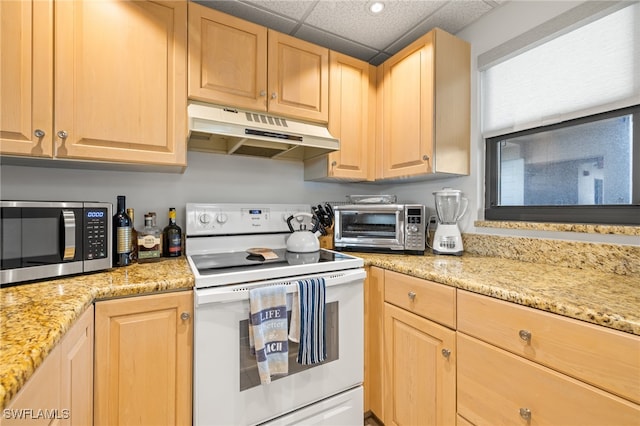 kitchen with light stone countertops, a drop ceiling, white range with electric cooktop, and light brown cabinets