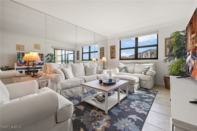 tiled living room featuring crown molding and a wealth of natural light