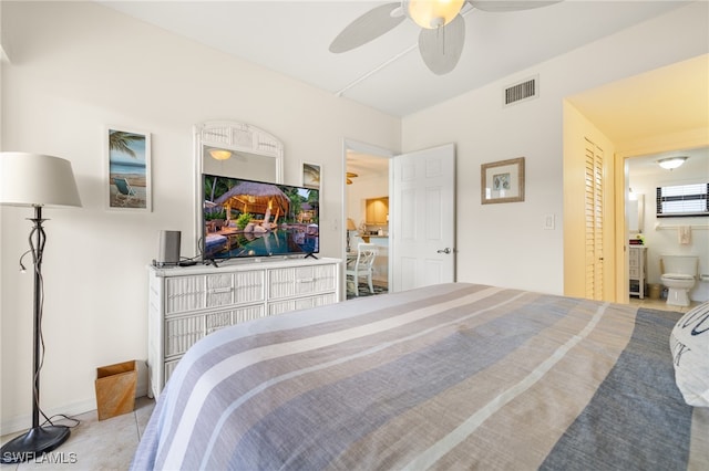 bedroom with ceiling fan and ensuite bathroom