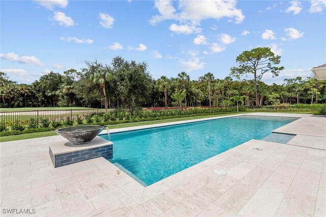 view of pool with a fenced in pool, a patio, and fence