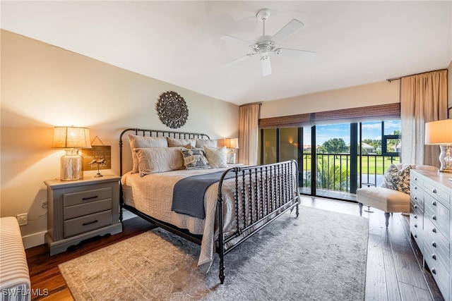 bedroom featuring access to exterior, ceiling fan, dark hardwood / wood-style floors, and radiator