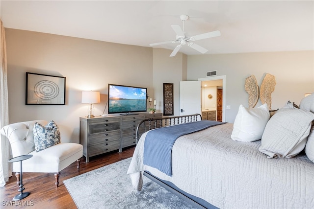 bedroom with wood-type flooring, ceiling fan, and lofted ceiling