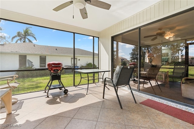 sunroom / solarium with ceiling fan