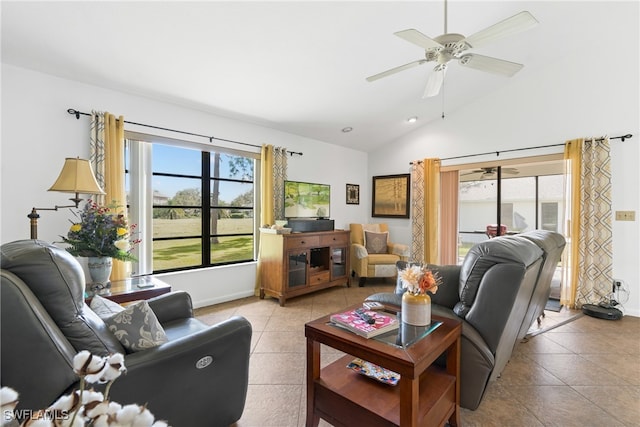 living room featuring lofted ceiling, light tile patterned floors, and ceiling fan