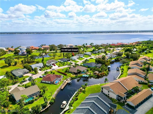 drone / aerial view featuring a water view