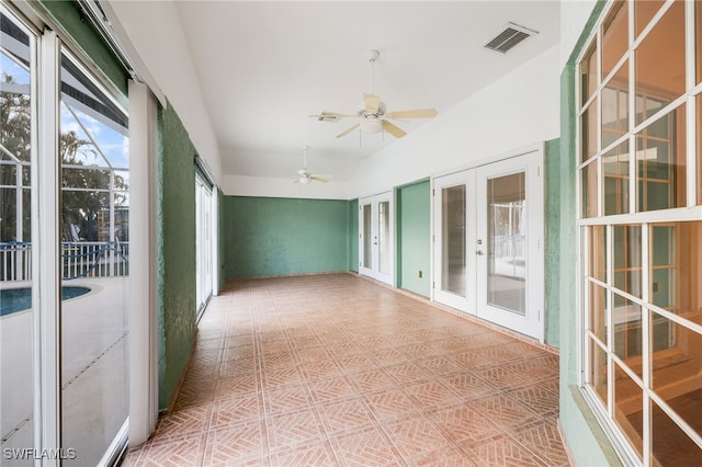 17585 Blackfriar Dr, Fort Myers, FL 33908 - unfurnished sunroom featuring french doors, ceiling fan, and lofted ceiling