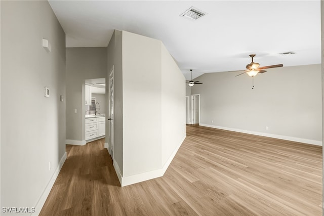 17585 Blackfriar Dr, Fort Myers, FL 33908 - interior space featuring light hardwood / wood-style flooring, high vaulted ceiling, and ceiling fan
