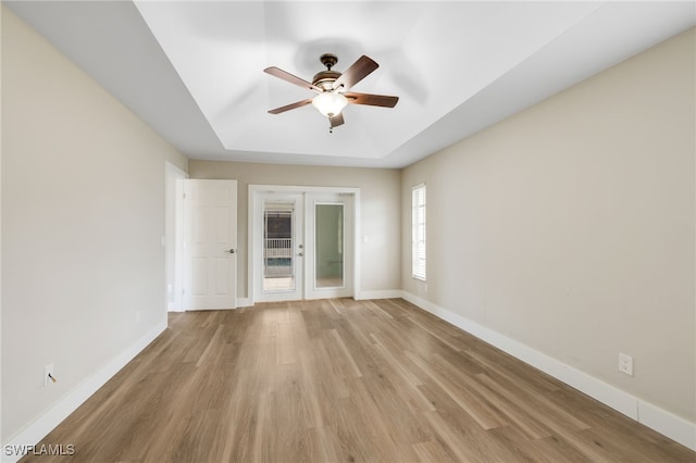 17585 Blackfriar Dr, Fort Myers, FL 33908 - spare room with french doors, light wood-type flooring, and ceiling fan