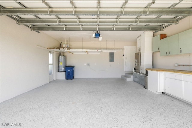 garage featuring a garage door opener, electric water heater, and electric panel