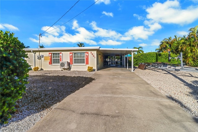 view of front of home featuring a carport