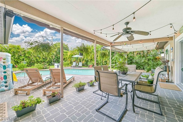 view of patio featuring ceiling fan