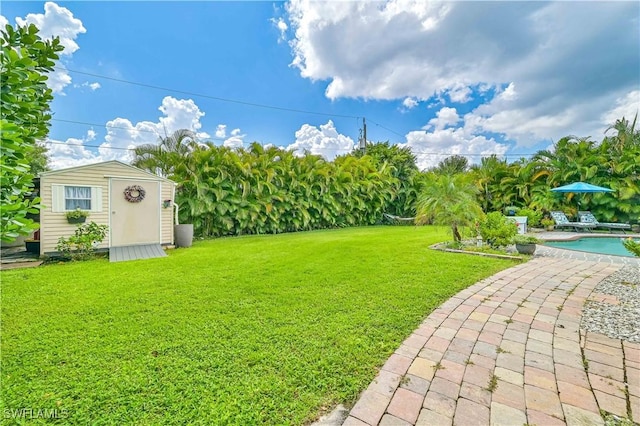 view of yard with a storage shed