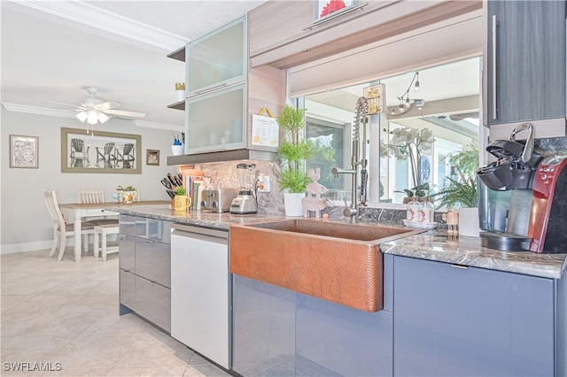 kitchen with dishwasher, sink, ornamental molding, light tile patterned flooring, and ceiling fan