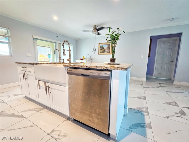 kitchen with dishwasher, ceiling fan, white cabinetry, and a center island with sink