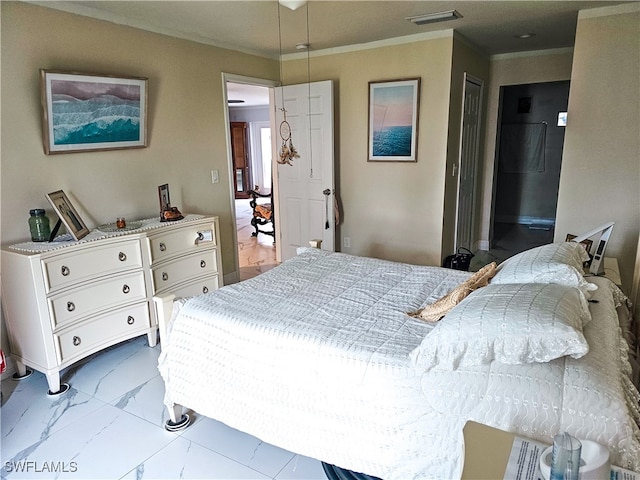 bedroom featuring ornamental molding and a closet