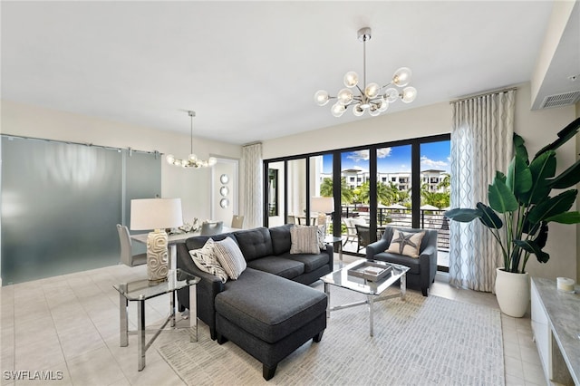 living room with light tile patterned floors, french doors, and a notable chandelier