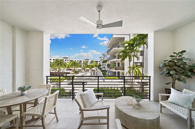 balcony featuring ceiling fan