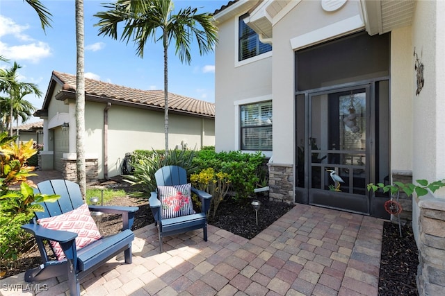 view of patio / terrace with a garage