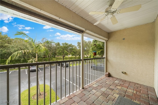 balcony featuring ceiling fan