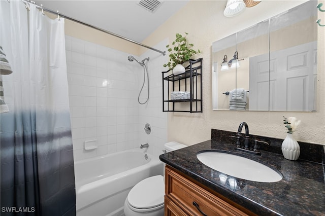 full bathroom featuring toilet, vanity, and shower / bathtub combination with curtain