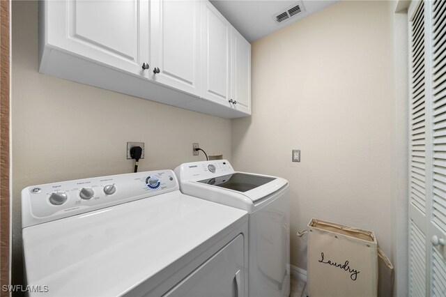 27083 Matheson Ave Unit 202, Bonita Springs, FL 34135 - washroom featuring cabinet space and washing machine and dryer