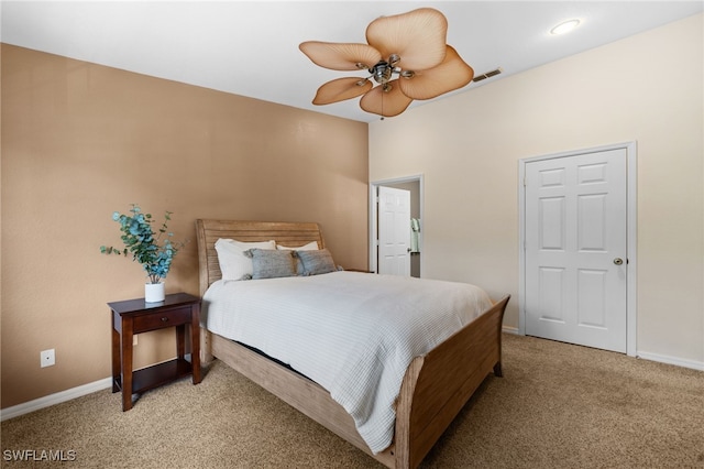 27083 Matheson Ave Unit 202, Bonita Springs, FL 34135 - bedroom featuring light carpet, baseboards, and a ceiling fan