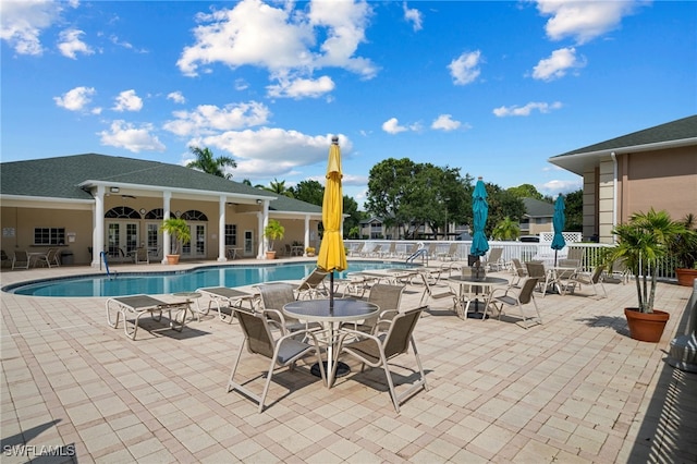 view of swimming pool featuring a patio area