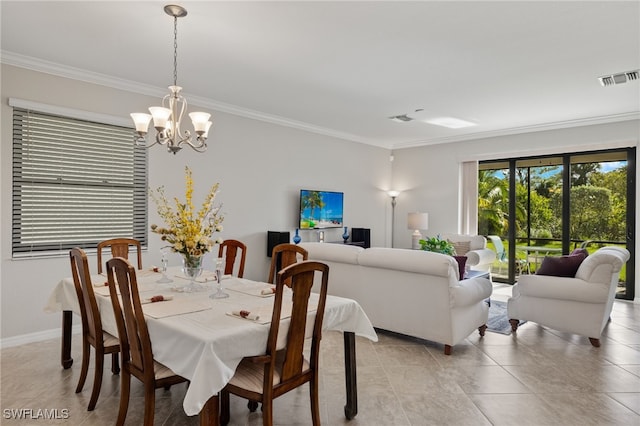 dining space with an inviting chandelier and crown molding