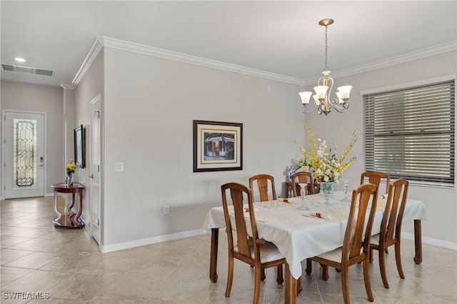 tiled dining room featuring crown molding and an inviting chandelier