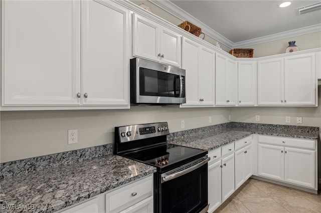 kitchen with stone counters, appliances with stainless steel finishes, white cabinetry, and crown molding