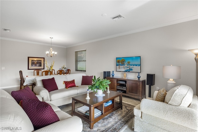 living room with crown molding and a notable chandelier