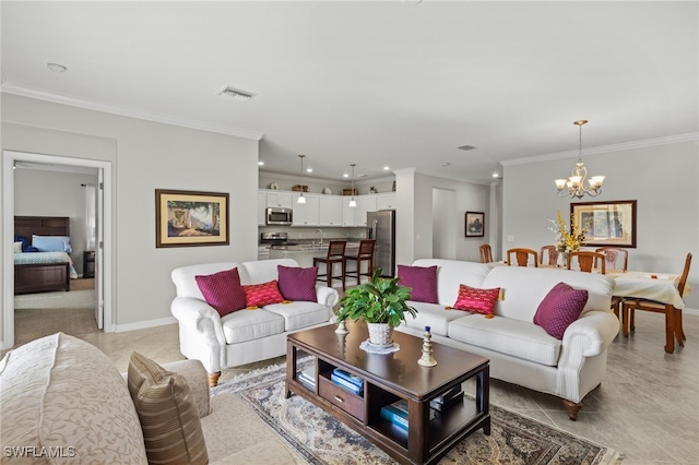 living room with crown molding and a chandelier