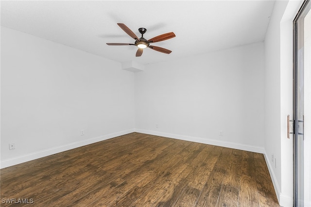 unfurnished room featuring ceiling fan and dark hardwood / wood-style floors