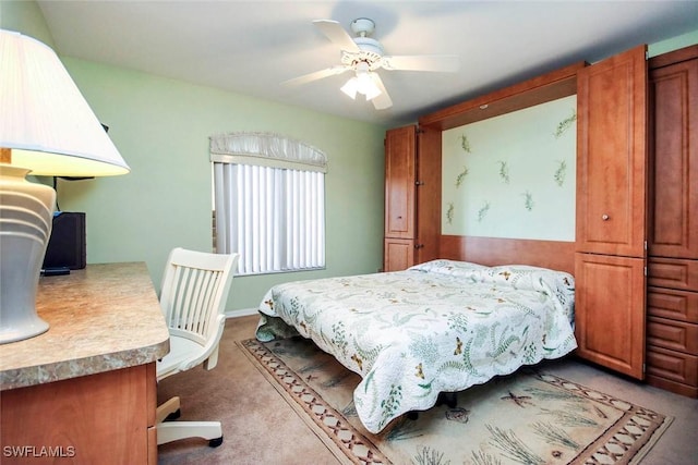 carpeted bedroom with a ceiling fan