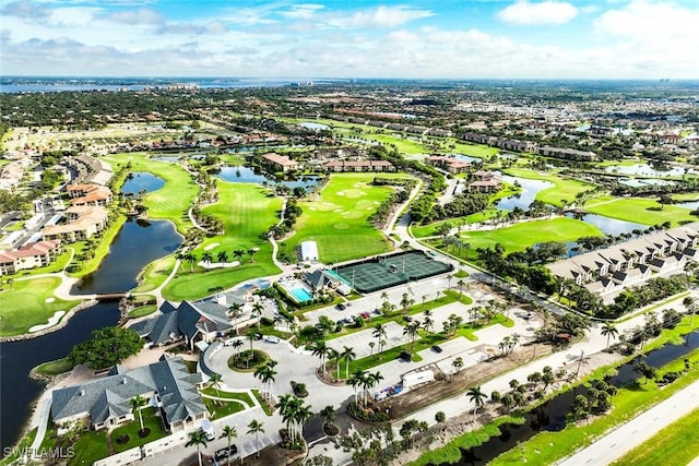 birds eye view of property featuring a residential view, golf course view, and a water view
