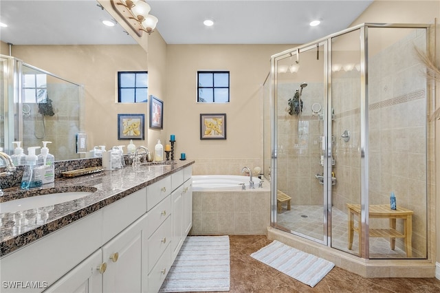 bathroom with vanity, plus walk in shower, and tile patterned floors