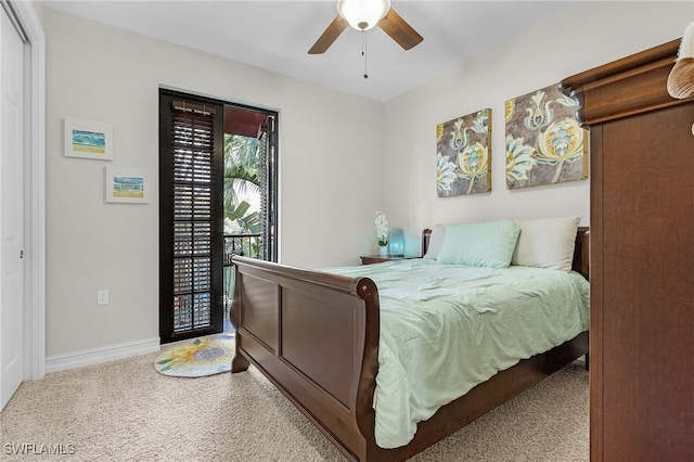 carpeted bedroom with ceiling fan and a closet