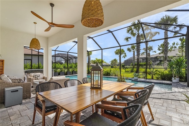 view of patio / terrace with outdoor lounge area and glass enclosure