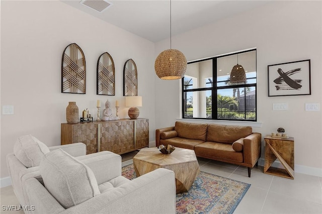 living room with light tile patterned flooring