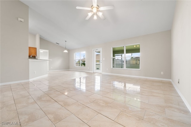 unfurnished living room featuring high vaulted ceiling, ceiling fan, and light tile patterned floors