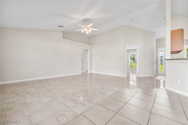 unfurnished room featuring ceiling fan and vaulted ceiling