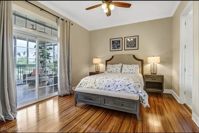 bedroom with access to outside, hardwood / wood-style floors, and ceiling fan