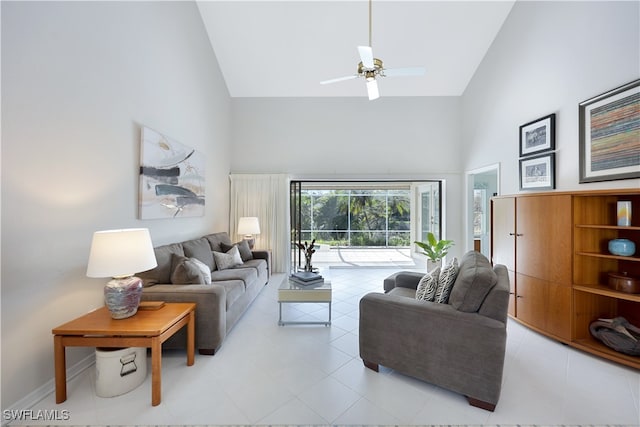 living room with high vaulted ceiling and ceiling fan